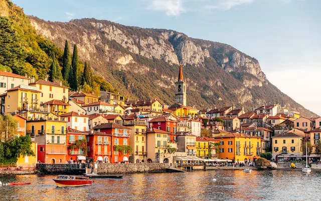 Lakeside scenery at Lake Como with mountains and village views